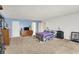 Bright bedroom with large windows, a cozy bed, and classic wooden furniture at 9243 Crossing Dr, Fishers, IN 46037