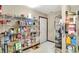 Spacious walk-in pantry with ample shelving, food, and cleaning supplies at 9243 Crossing Dr, Fishers, IN 46037