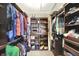 Custom walk-in closet with built-in shelving and hanging rods provides ample storage space at 9243 Crossing Dr, Fishers, IN 46037