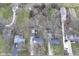 An aerial view shows the layout of houses, with mature trees and ample yard space at 9923 N 125 W, Fortville, IN 46040