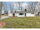 Charming single story home with white siding, covered porch and well-maintained lawn at 9923 N 125 W, Fortville, IN 46040