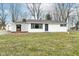Charming single story home with white siding, covered porch and well-maintained lawn at 9923 N 125 W, Fortville, IN 46040
