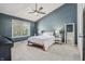 Bedroom with a window that allows natural light and a closet at 10576 Greenway Dr, Fishers, IN 46037