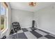 Bright workout room featuring weights, window, and durable rubber flooring at 10576 Greenway Dr, Fishers, IN 46037