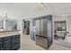 Spacious kitchen with stainless steel appliances, stylish cabinets, and an adjoining dining area for easy meals at 10576 Greenway Dr, Fishers, IN 46037