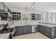 Bright, modern kitchen with stainless steel appliances, sleek countertops, and ample storage space at 10576 Greenway Dr, Fishers, IN 46037