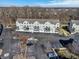 Aerial view of condo buildings featuring ample parking and a well-maintained community at 1074 Reserve Way, Indianapolis, IN 46220