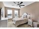 Bright and cozy bedroom with neutral tones, plush carpeting, and natural light, creating a serene retreat at 1074 Reserve Way, Indianapolis, IN 46220