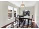 Bright dining area with large windows and modern lighting, perfect for Gathering meals and entertaining at 1074 Reserve Way, Indianapolis, IN 46220
