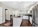 Beautiful kitchen featuring a center island with granite countertops, stainless appliances, and ample cabinet space at 1074 Reserve Way, Indianapolis, IN 46220