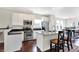 Modern kitchen with stainless steel appliances, granite countertops, and island seating at 1074 Reserve Way, Indianapolis, IN 46220