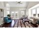 Spacious living room with hardwood floors, comfortable seating, and bright natural light at 1074 Reserve Way, Indianapolis, IN 46220