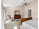 Cozy main bedroom featuring vaulted ceilings, comfortable seating, and neutral carpet at 1074 Reserve Way, Indianapolis, IN 46220