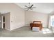 Spacious main bedroom with a vaulted ceiling, neutral carpet, and ample natural light at 1074 Reserve Way, Indianapolis, IN 46220