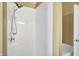 Modern shower with shower head and built-in shelving at 1074 Reserve Way, Indianapolis, IN 46220