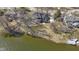 Beautiful aerial view of the home showcasing its landscaping and proximity to the lake at 10817 Lakeview Dr, Carmel, IN 46033