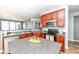 Well-equipped kitchen features stainless steel appliances, ample cabinet space, and granite countertops at 1120 Oak Hill Ln, Cicero, IN 46034