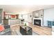 Open floor plan with living room fireplace and view of the kitchen and dining area at 1120 Oak Hill Ln, Cicero, IN 46034