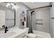 Tastefully updated bathroom with modern fixtures, white vanity, and shower-tub combination at 129 W Clear Lake Ln, Westfield, IN 46074