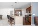Modern kitchen with granite countertops, stainless steel appliances, and breakfast bar at 1382 Redstone Dr, Avon, IN 46123
