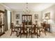 Formal dining room with stylish chandelier and large dining table, perfect for entertaining guests and Gathering gatherings at 1409 S Harmony Trl, Greenfield, IN 46140