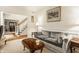 Inviting living room with elegant décor and a view to the staircase creates a warm and sophisticated atmosphere at 1409 S Harmony Trl, Greenfield, IN 46140