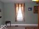 Bedroom featuring neutral colors, crown molding, and abundant natural light at 1507 Hannibal St, Noblesville, IN 46060