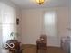 Bright, open living area featuring hardwood floors, neutral walls, and large windows at 1507 Hannibal St, Noblesville, IN 46060