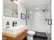 Modern bathroom featuring a glass-enclosed shower with subway tile and a stylish vanity with a vessel sink at 15104 Midland Ln, Noblesville, IN 46062