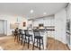 Bright and modern kitchen with white cabinets, stainless steel appliances, a breakfast bar, and an open layout at 15104 Midland Ln, Noblesville, IN 46062