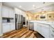 Kitchen includes stainless steel appliances, ample counter space, and is open to other living spaces at 15506 Slateford Rd, Noblesville, IN 46062