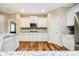 The kitchen features white cabinets, granite countertops, stainless steel appliances, and wood-style flooring at 15506 Slateford Rd, Noblesville, IN 46062