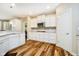 Kitchen with modern stainless steel appliances, sleek white cabinetry and ample counter space at 15506 Slateford Rd, Noblesville, IN 46062