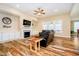 Bright living room features a fireplace, built-in cabinets, and plenty of natural light at 15506 Slateford Rd, Noblesville, IN 46062