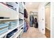 Walk-in closet featuring custom shelving and ample storage space for clothes and accessories at 15506 Slateford Rd, Noblesville, IN 46062