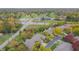 Expansive aerial view showcasing the home's location near a golf course and overlooking the neighborhood at 1738 Pathway S Dr, Greenwood, IN 46143