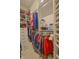 Walk in closet is organized with shelves and plenty of hanger space at 1738 Pathway S Dr, Greenwood, IN 46143