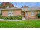 Charming brick home with lush green lawn and beautifully landscaped front yard, creating inviting curb appeal at 1738 Pathway S Dr, Greenwood, IN 46143