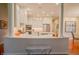 Spacious kitchen with a breakfast bar, white cabinets, and stainless steel appliances at 1738 Pathway S Dr, Greenwood, IN 46143