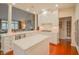 Bright kitchen with white cabinetry, stainless steel appliances, island, and open floor plan at 1738 Pathway S Dr, Greenwood, IN 46143