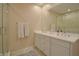 Bright main bathroom with double vanity, walk-in shower, and modern fixtures for a luxurious feel at 1738 Pathway S Dr, Greenwood, IN 46143