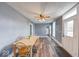 Spacious dining room with hardwood floors, neutral paint, and lots of natural light at 1828 Central Ave, Columbus, IN 47201