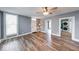 Inviting living room boasts lots of natural light, hardwood floors, and neutral paint at 1828 Central Ave, Columbus, IN 47201
