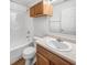 Clean bathroom featuring a shower-tub combo, vanity with storage, and well-maintained fixtures at 1914 Kingen Dr, Greenfield, IN 46140