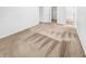 Comfortable bedroom with neutral carpet, white walls, and doorways leading to a closet and bathroom at 1914 Kingen Dr, Greenfield, IN 46140