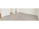 Spacious bedroom features neutral carpet, white trim, and an open doorway at 19599 Atwater Ave, Sheridan, IN 46069