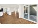 Open floor plan connecting kitchen, living area and walk out patio at 19599 Atwater Ave, Sheridan, IN 46069