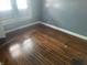 Cozy bedroom with hardwood floors, offering a serene living space at 2022 N Olney St, Indianapolis, IN 46218