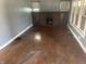 Spacious living room with a brick fireplace and bright, natural light at 2022 N Olney St, Indianapolis, IN 46218