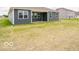 Home exterior showcasing back patio and yard at 2254 Oakmont Dr, Plainfield, IN 46168